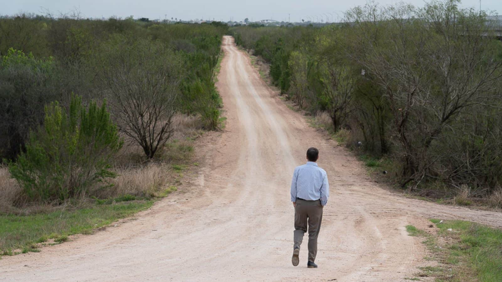 Jay Timmons walks along U.S. - Mexico Border