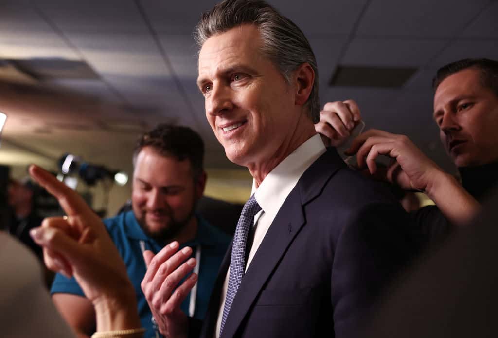 a man wearing a suit and tie